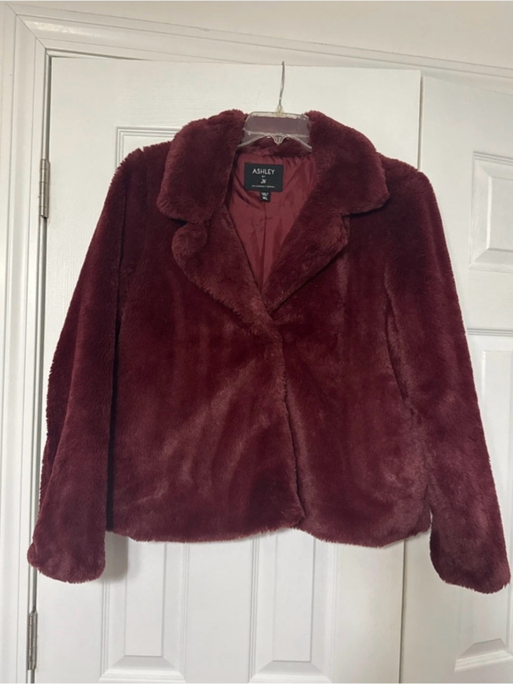 Ashley by 26 International faux fur jacket in a rich burgundy. Size US XL.